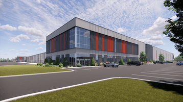 Rendering of industrial building with glass entry, orange accents, and landscaped parking area