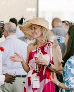 Jennifer Barnes talks to other employee-owners at an Owners Day party