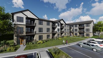 Rendering of a three-story apartment with gray siding, white panels, stone accents, black balconies, and landscaping